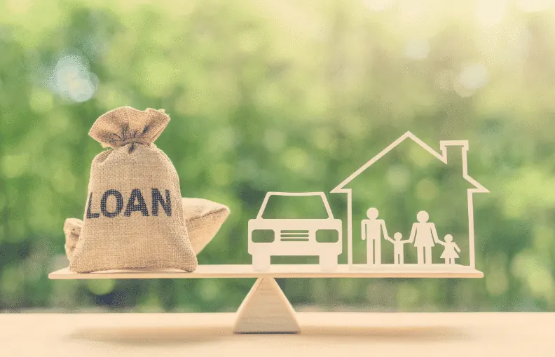 A home equity loan agreement being signed at a table