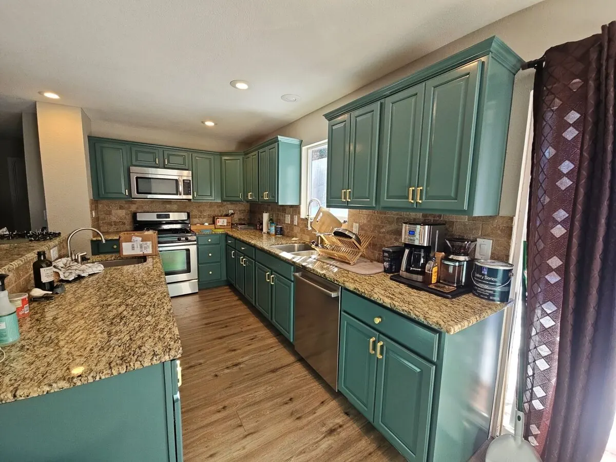 Denver kitchen cabinets after repainting by Kind Home Painting